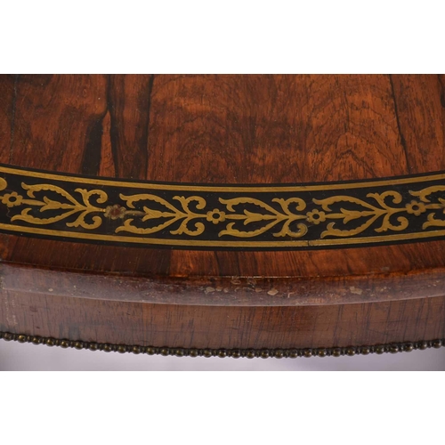 333 - An early 19th century figured rosewood breakfast table, the top with a running band of stylized anth... 