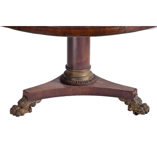 333 - An early 19th century figured rosewood breakfast table, the top with a running band of stylized anth... 