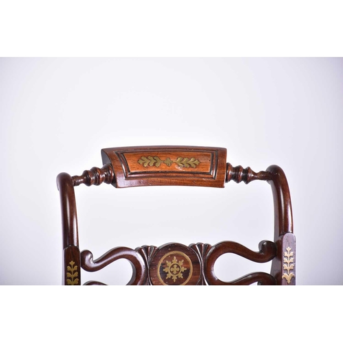 335 - A set of four Regency brass inlaid mahogany side chairs with turned backrest and pierced and shaped ... 