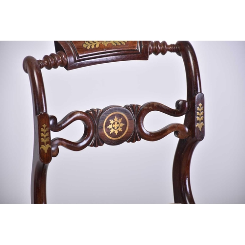 335 - A set of four Regency brass inlaid mahogany side chairs with turned backrest and pierced and shaped ... 