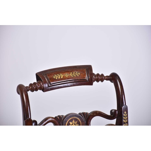 335 - A set of four Regency brass inlaid mahogany side chairs with turned backrest and pierced and shaped ... 