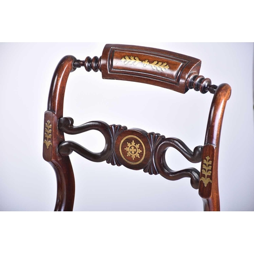 335 - A set of four Regency brass inlaid mahogany side chairs with turned backrest and pierced and shaped ... 