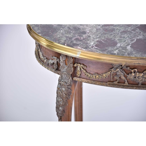 336 - A Louis XVI style mahogany topped oval side table with single frieze drawer and with gilt metal moun... 