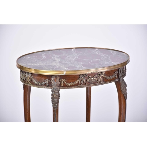 336 - A Louis XVI style mahogany topped oval side table with single frieze drawer and with gilt metal moun... 