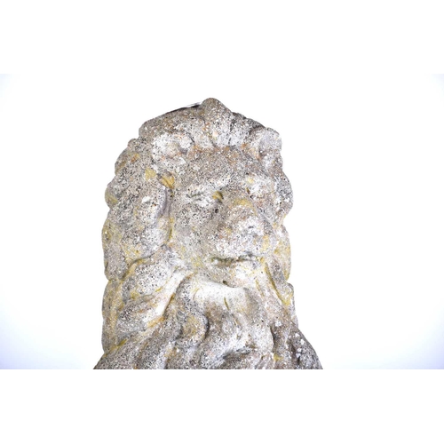 343 - A pair of cast stone figures of standing heraldic lions each holding a shield with 