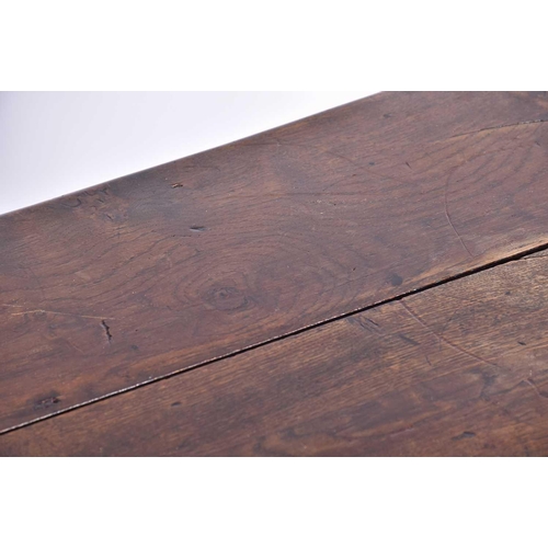 344 - An early 18th-century oak oval gateleg table with single frieze drawer and turned Doric column spind... 