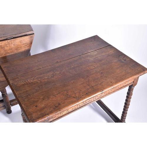 344 - An early 18th-century oak oval gateleg table with single frieze drawer and turned Doric column spind... 