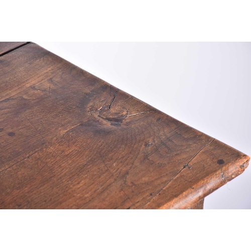 344 - An early 18th-century oak oval gateleg table with single frieze drawer and turned Doric column spind... 