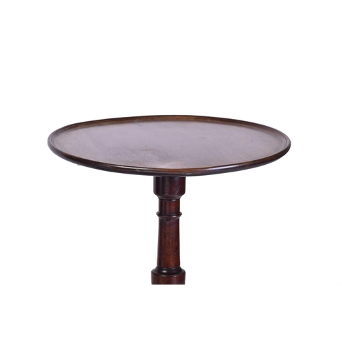 348 - A Regency dish topped circular mahogany wine table with an urn column and inverted sure supports ter... 