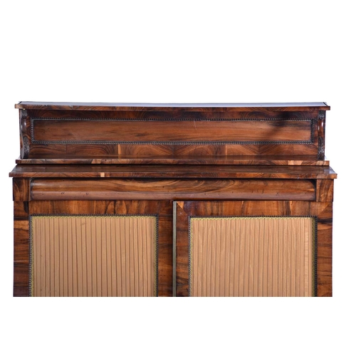 354 - A Regency goncalo alves chiffonier, with a two shelf superstructure above a base with a pair of plai... 