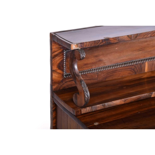 354 - A Regency goncalo alves chiffonier, with a two shelf superstructure above a base with a pair of plai... 