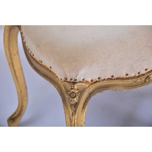 355 - † A set of six Louis XV style carved wood and gilt gesso salon chairs, early 20th century, with flor... 