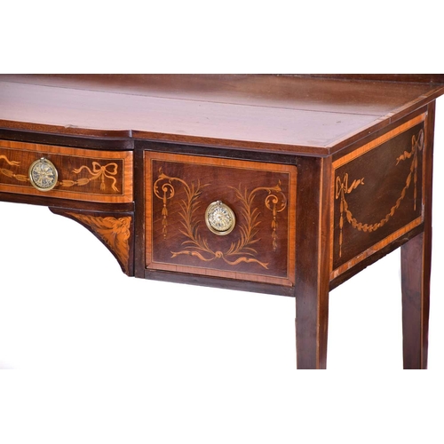 363 - An Edwardian marquetry inlaid mahogany break bow-fronted kneehole side table with satinwood crossban... 