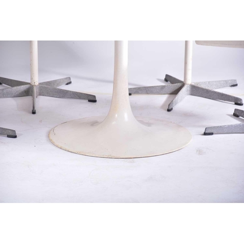 364 - An Arkana circular white melamine Tulip dining table and four 