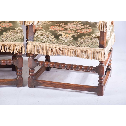 365 - A set of Charles II style oak farthingale dining chairs, early 20th century, comprising two carver c... 