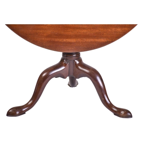 374 - A George III 'Cuban Mahogany' circular tilt-top tripod table, With birdcage movement above bold cabr... 