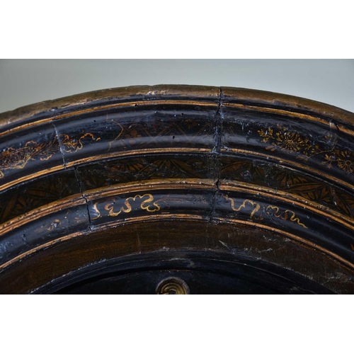 375 - A Queen Anne black lacquer double dome cabinet on a gilt stand. The upper section is decorated throu... 