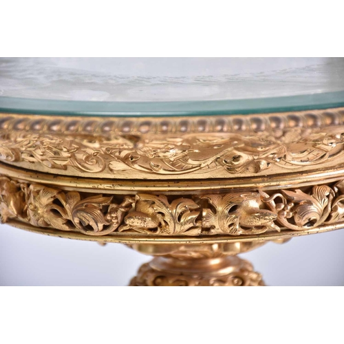 390 - A fine and unusual fire gilt cast bronze circular centre table, 19th century probably by Elkington &... 