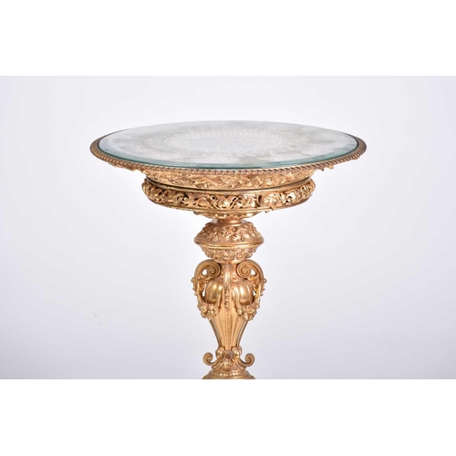 390 - A fine and unusual fire gilt cast bronze circular centre table, 19th century probably by Elkington &... 