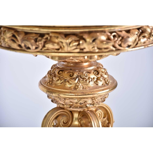 390 - A fine and unusual fire gilt cast bronze circular centre table, 19th century probably by Elkington &... 