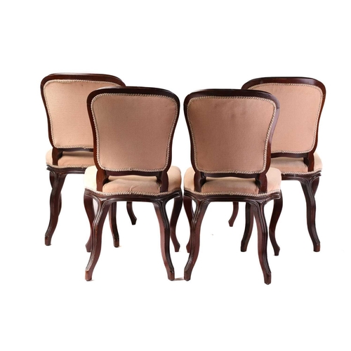 392 - A set of four Louis XV style mahogany cartouch backed side chairs with moulded frames and stuff over... 