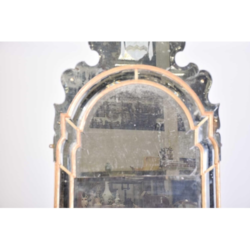 400 - A pair of unusual bevel-edged and partial gilt-framed armorial pier-glass, English early 18th centur... 