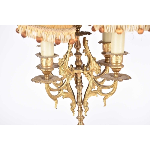 405 - A pair of gilt metal and onyx electric five branch candelabra, 63.5cm overal, together with a pair o... 