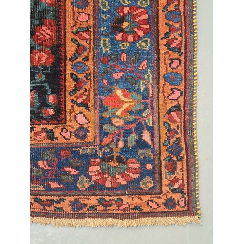 407 - A dark blue ground Bidjar rug, 20th century, with 