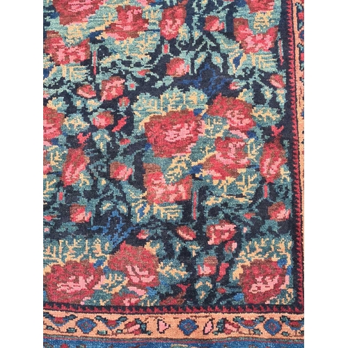 407 - A dark blue ground Bidjar rug, 20th century, with 