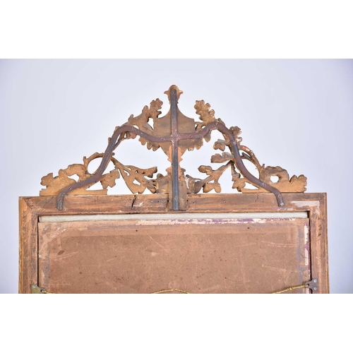 409 - A late 18th century probably Italian carved wood and gilt gesso wall mirror with pierced oakleaf and... 