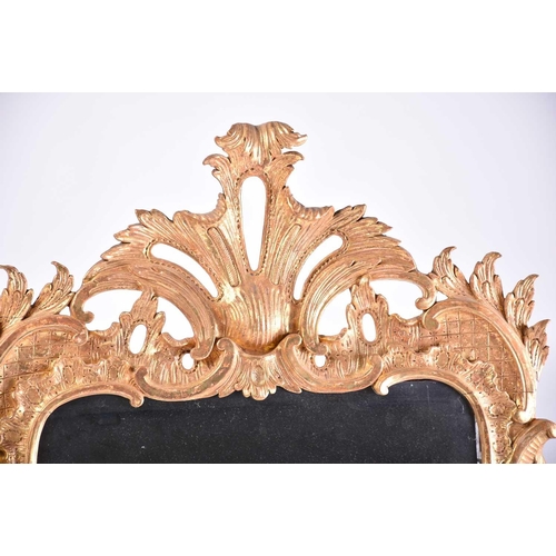 416 - A good 18th-century carved wood and gilt gesso rectangular rococo wall mirror with overarching leafy... 