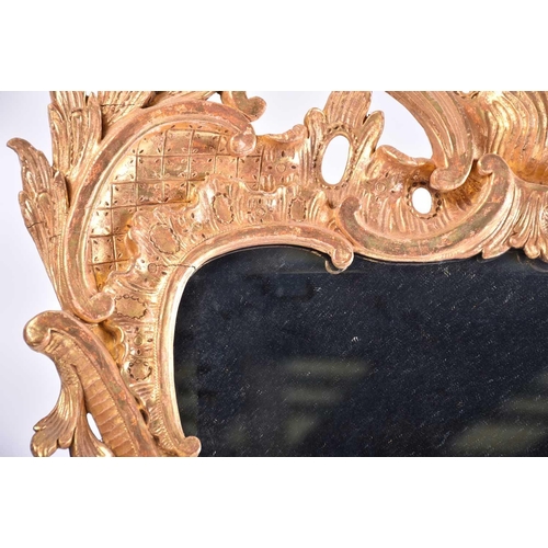 416 - A good 18th-century carved wood and gilt gesso rectangular rococo wall mirror with overarching leafy... 