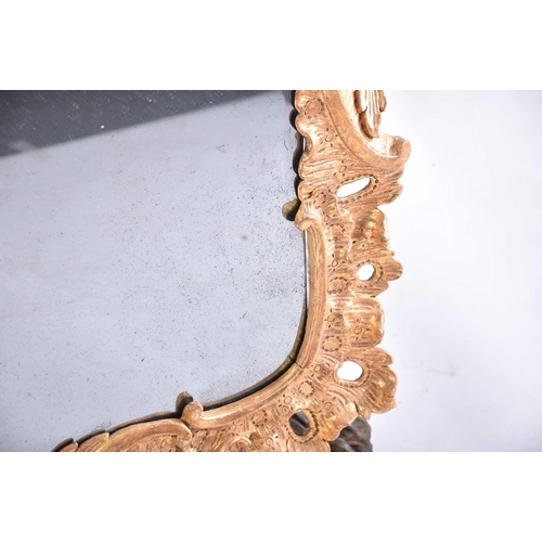 416 - A good 18th-century carved wood and gilt gesso rectangular rococo wall mirror with overarching leafy... 