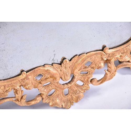 416 - A good 18th-century carved wood and gilt gesso rectangular rococo wall mirror with overarching leafy... 