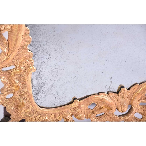 416 - A good 18th-century carved wood and gilt gesso rectangular rococo wall mirror with overarching leafy... 