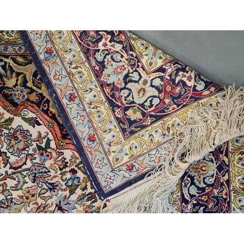 419 - A pair of ivory ground silk on silk Isfahan 