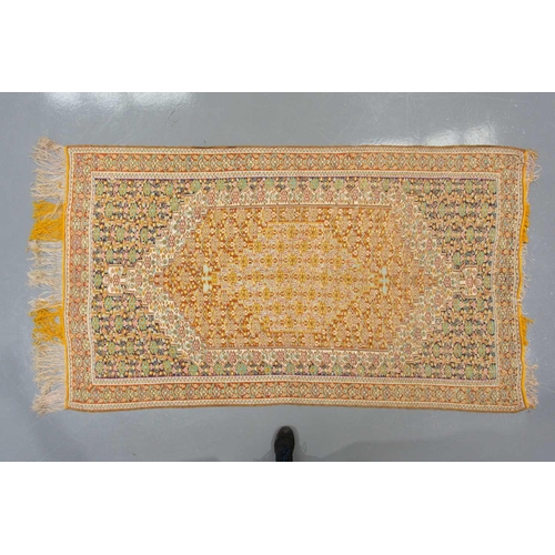 422 - An ochre ground Turkish silk Kelim rug with a large central lozenge filled with geometric designs wi... 