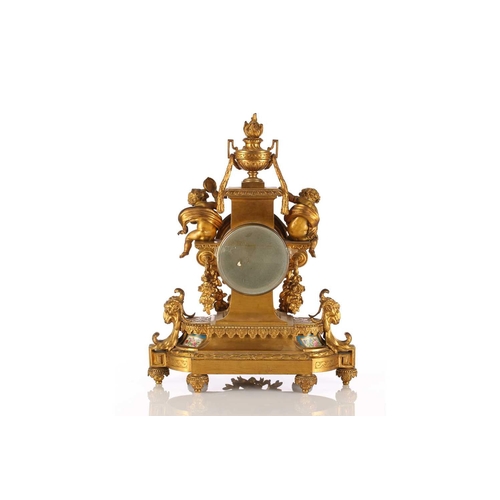 425 - A late 19th century Samuel Marti et Cie 8-day ormolu mantle clock with flaming urn finial and inset ... 