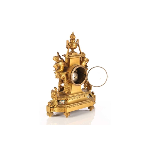 425 - A late 19th century Samuel Marti et Cie 8-day ormolu mantle clock with flaming urn finial and inset ... 