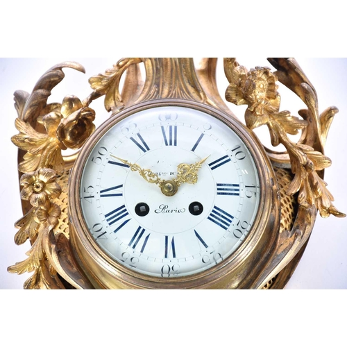 427 - A French gilt bronze cartel clock, late 19th century, the movement by Samuel Marti & Co, chiming on ... 