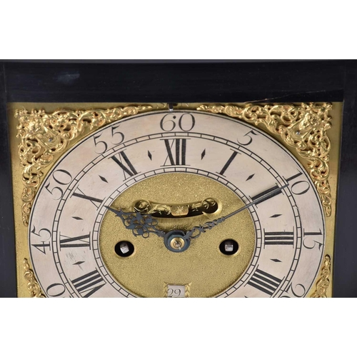 429 - A George I/II ebonized twin fusee repeat chiming table clock, The inverted bell top case with a well... 