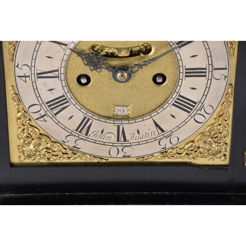 429 - A George I/II ebonized twin fusee repeat chiming table clock, The inverted bell top case with a well... 