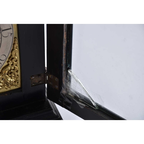 429 - A George I/II ebonized twin fusee repeat chiming table clock, The inverted bell top case with a well... 