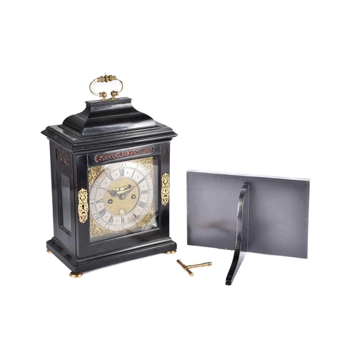 429 - A George I/II ebonized twin fusee repeat chiming table clock, The inverted bell top case with a well... 