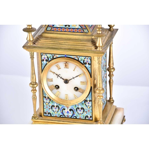 431 - A French gilt metal and champleve enamel mantel clock, 19th century, with turned finials and columns... 