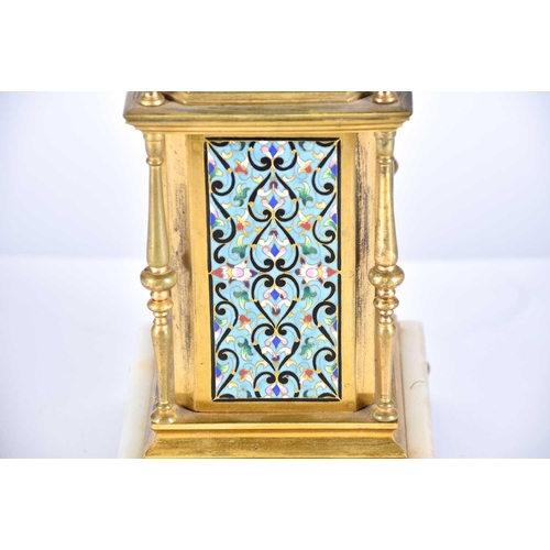 431 - A French gilt metal and champleve enamel mantel clock, 19th century, with turned finials and columns... 