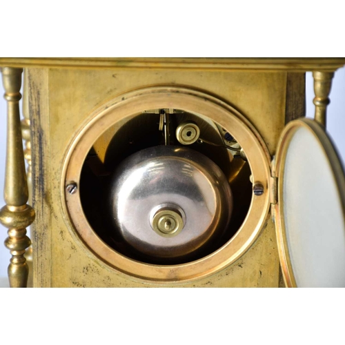 431 - A French gilt metal and champleve enamel mantel clock, 19th century, with turned finials and columns... 