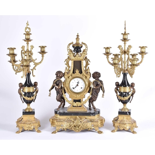 432 - A 20th Century Louis XVI style clock garniture set by the Imperial clock company of Italy, the set c... 