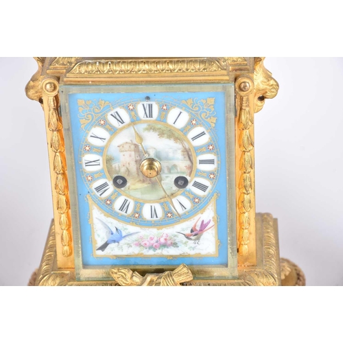 435 - A matched gilt metal clock garniture, 19th century, each with Paris porcelain panels, the clock with... 