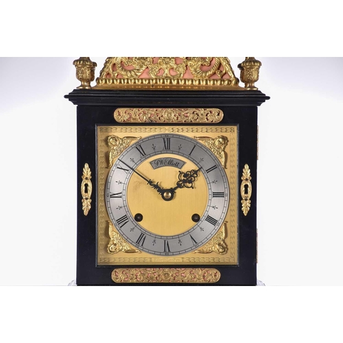 443 - An F W Elliott Golden Jubilee bracket clock, the ebonised case with gilt metal mounts, chiming on th... 